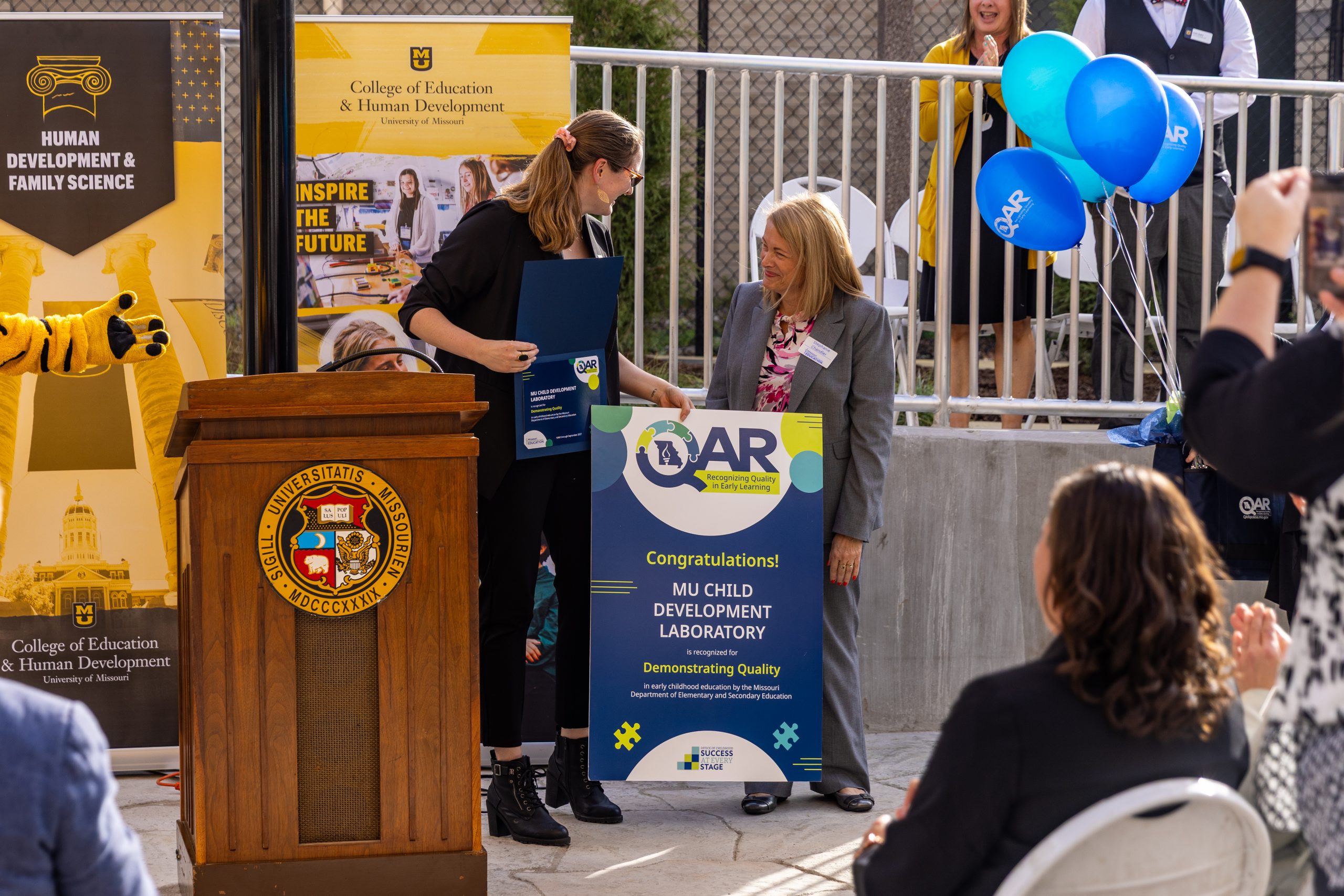 Miranda Clines, Director of the Child Development Lab, accepts the Quality Assurance Award.